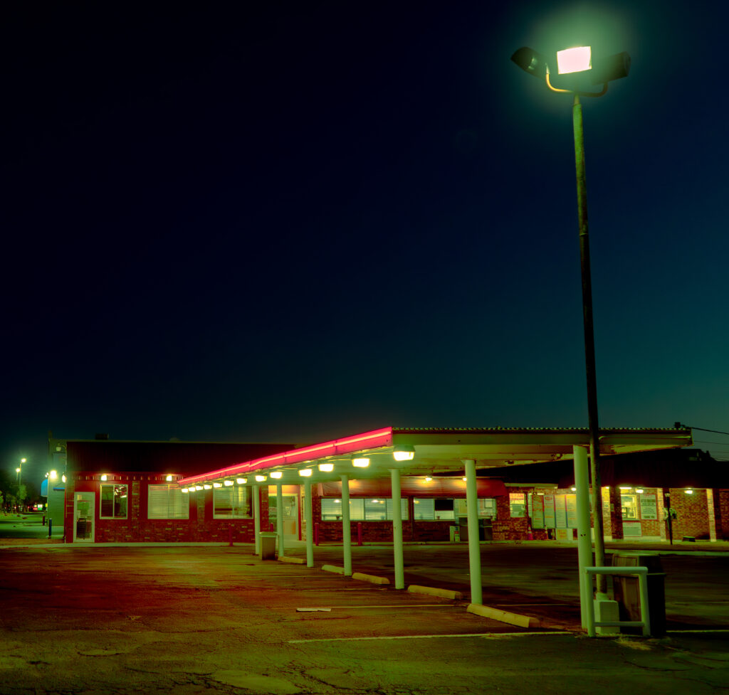 a fast food parking lot at night